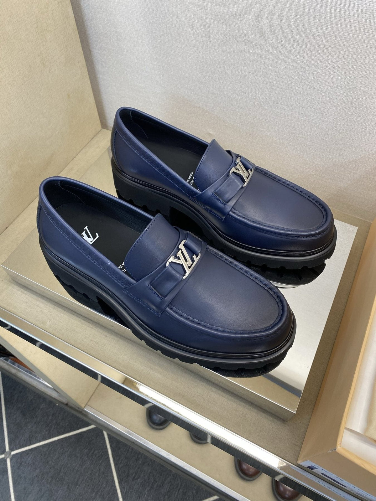 Louis Vuitton Metal Logo Loafers — front