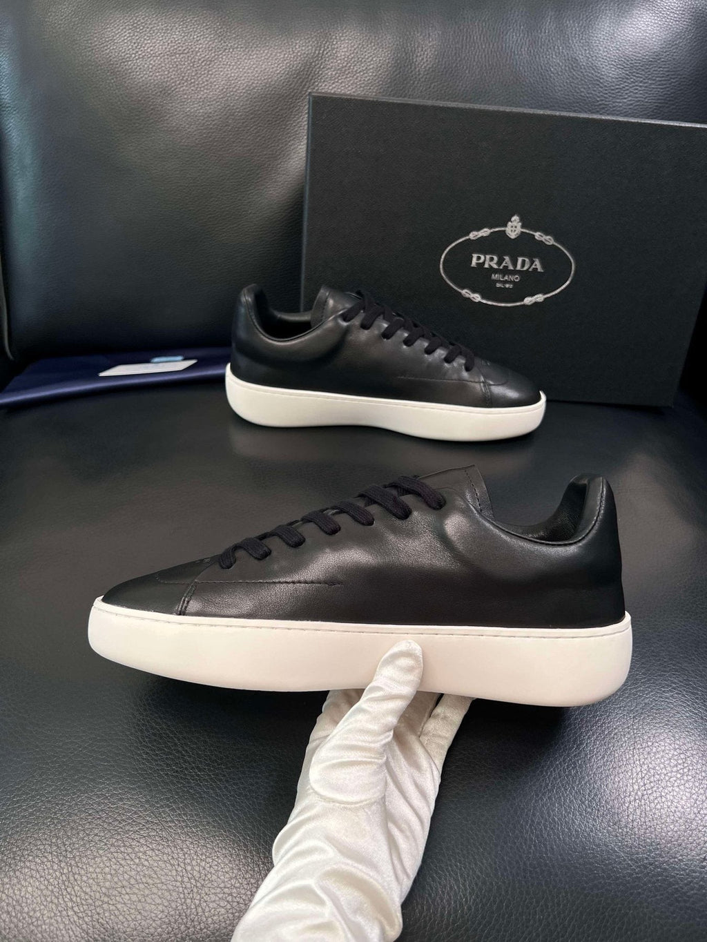 Prada Low-Top Leather Sneakers — side